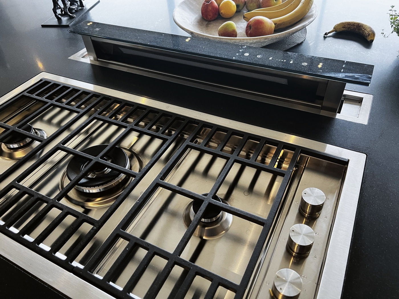 A hob set into painted cabinetry in an Essex kitchen