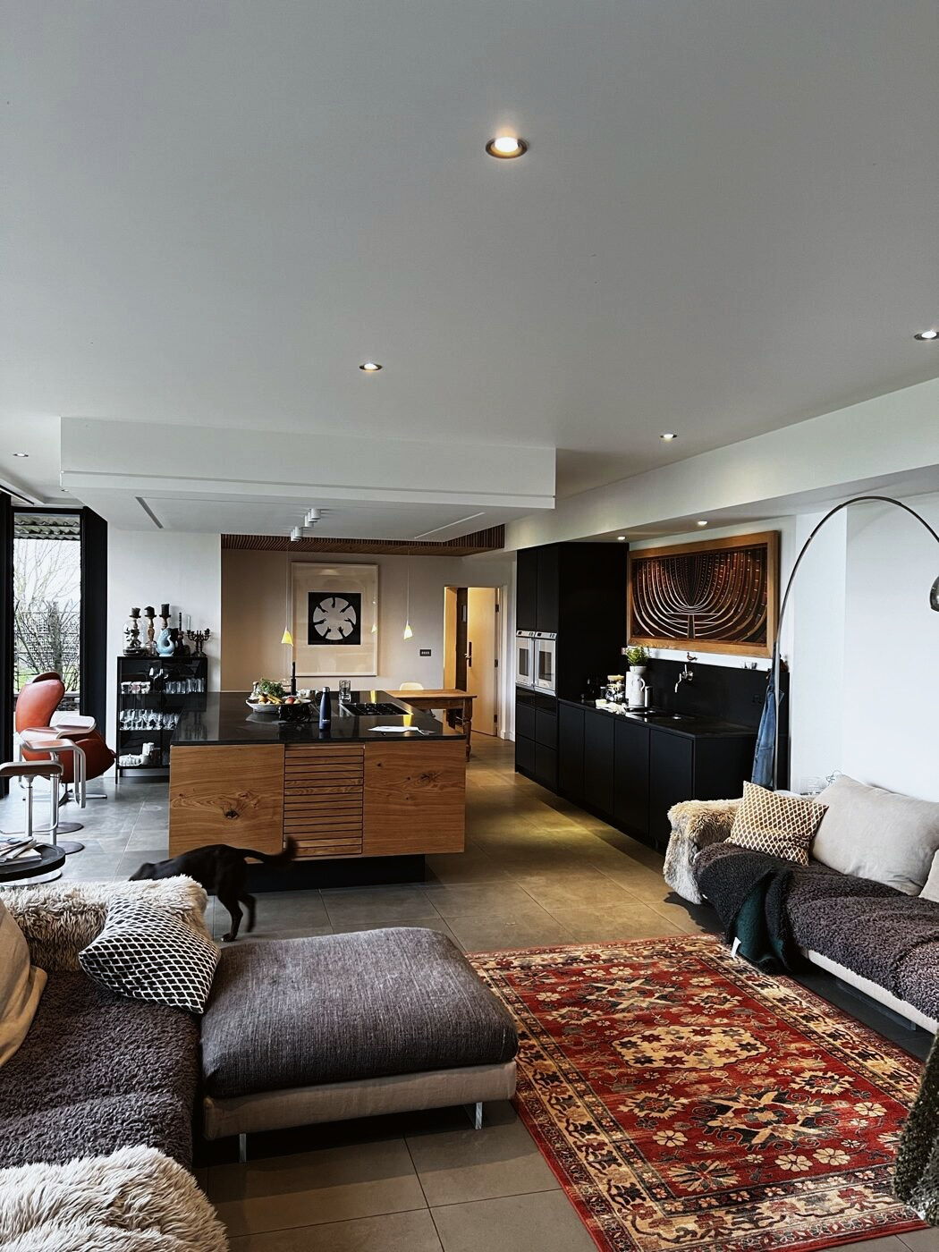 The kitchen seen from the living end of the room