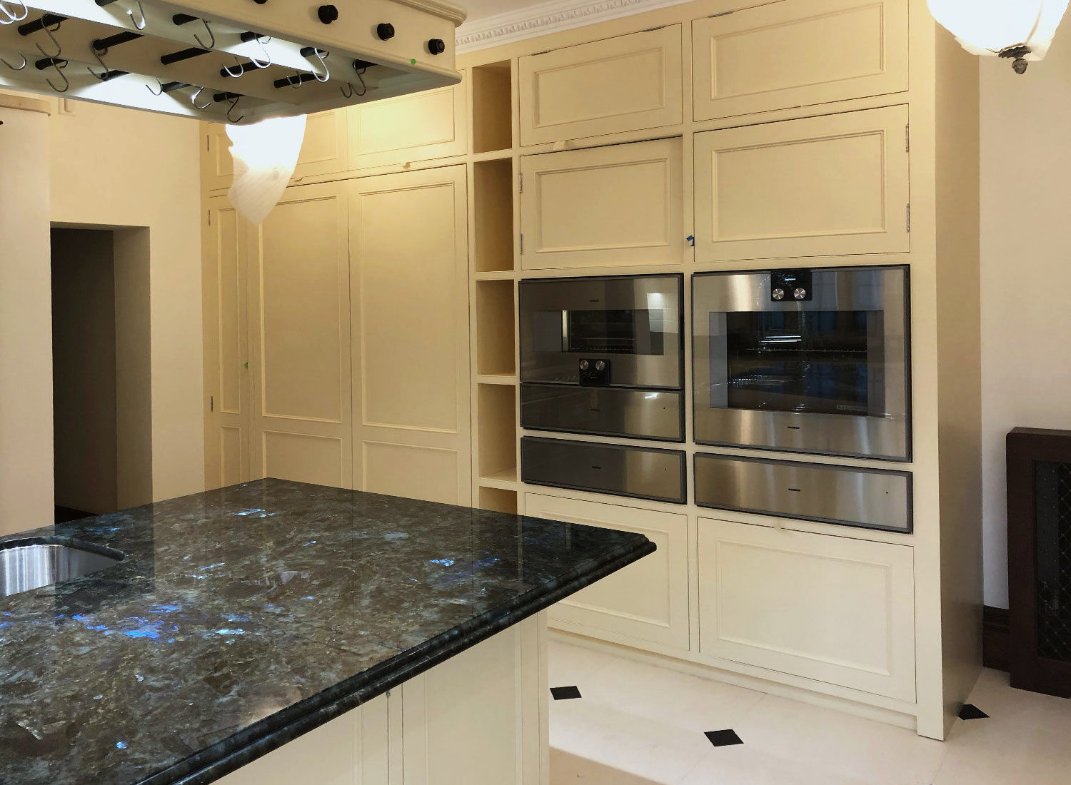 A moulded kitchen island with an integrated oven