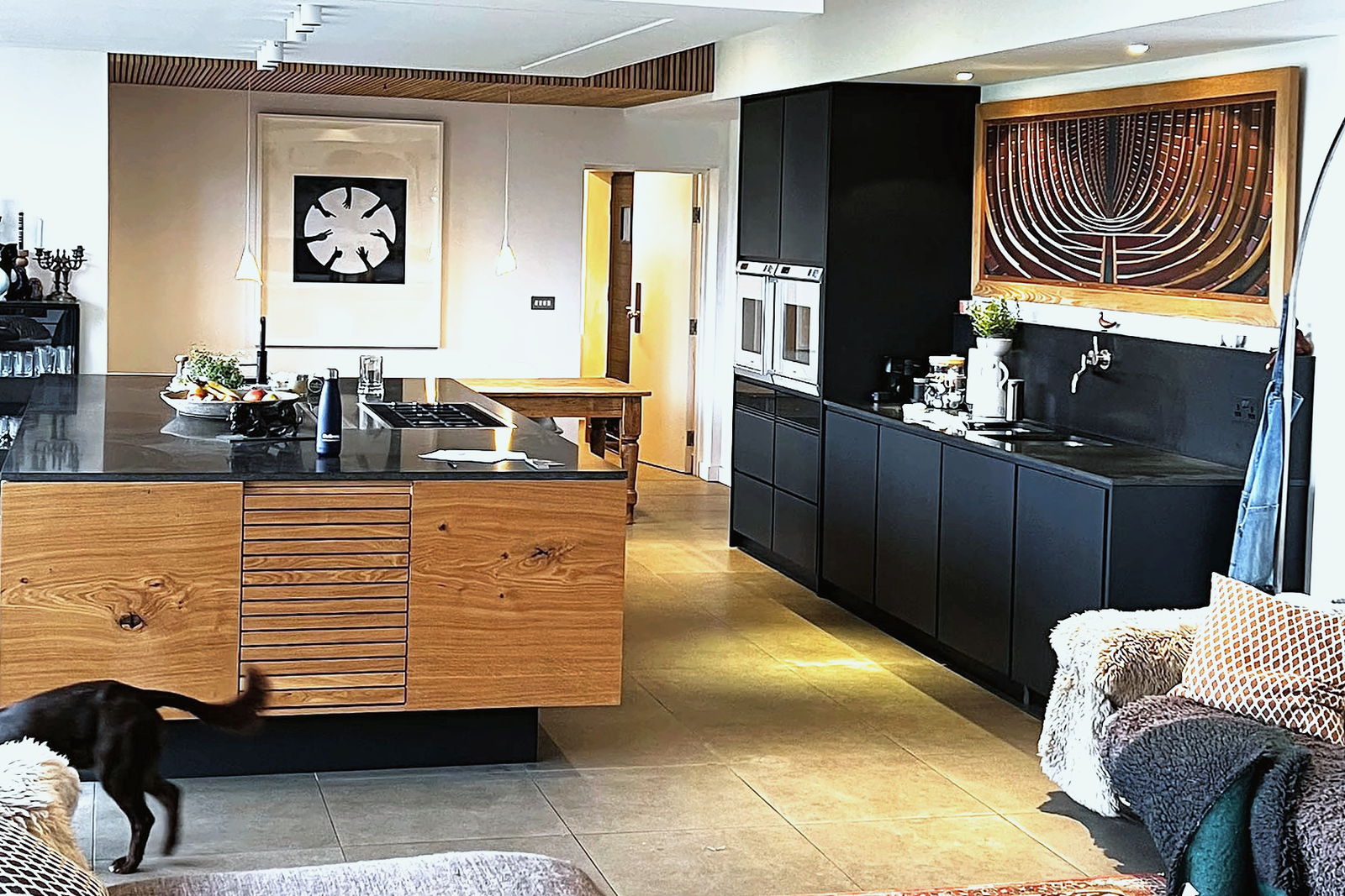 A bespoke English kitchen with painted cabinetry and timber details