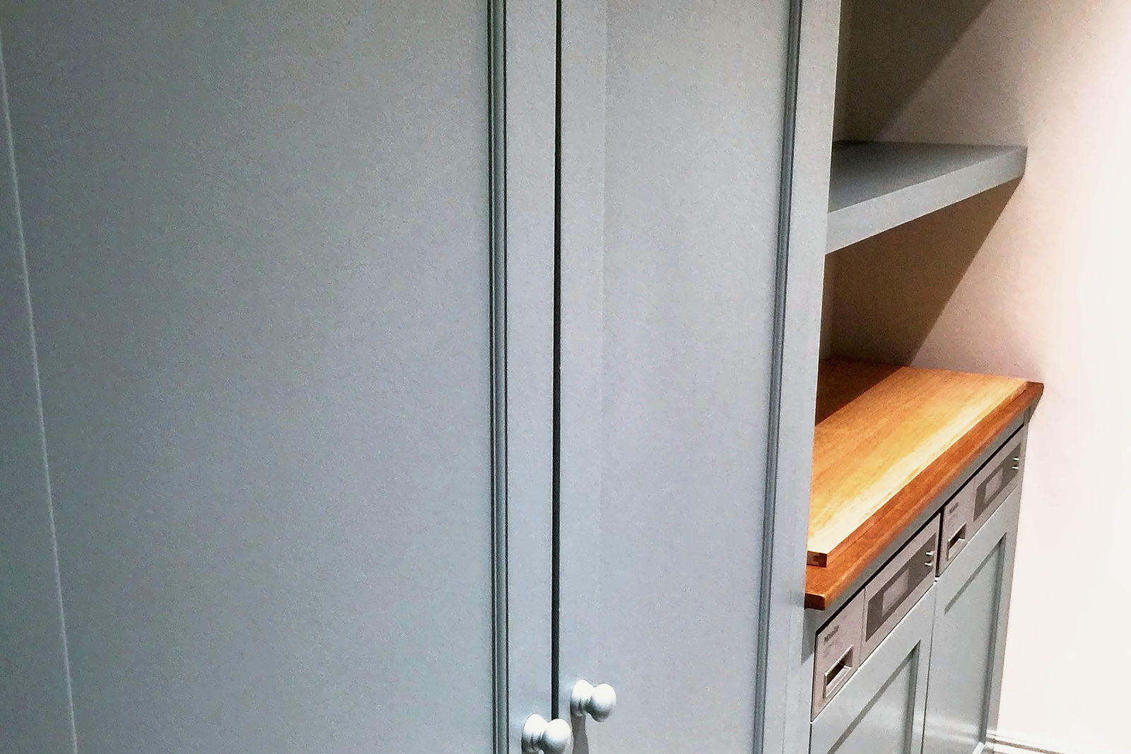 A hand-painted kitchen with a scullery, pantry and utility rooms in an Essex house
