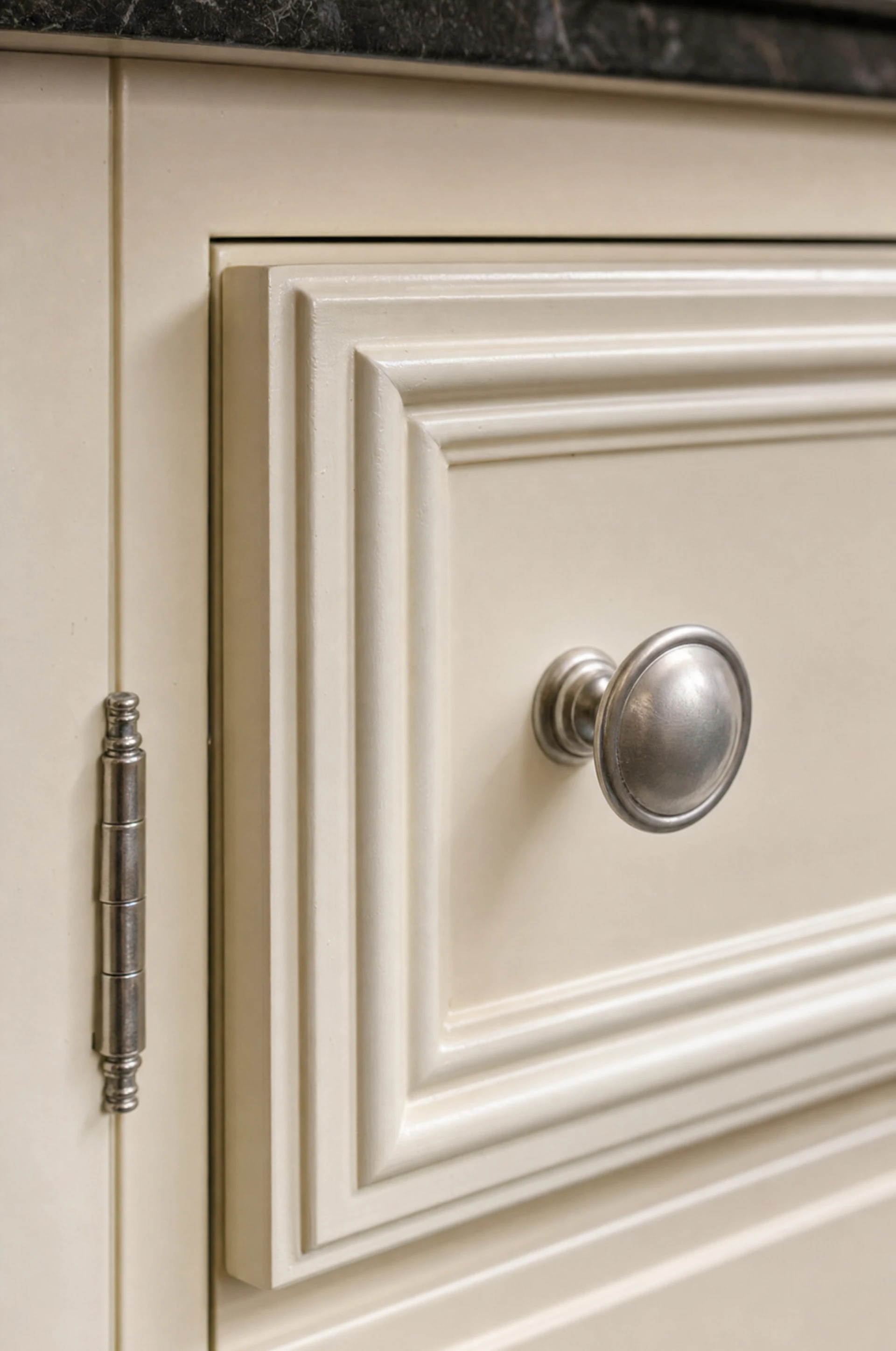 Aged brass cup handles on a moulded in-frame drawer front, The Essex range by Square & True