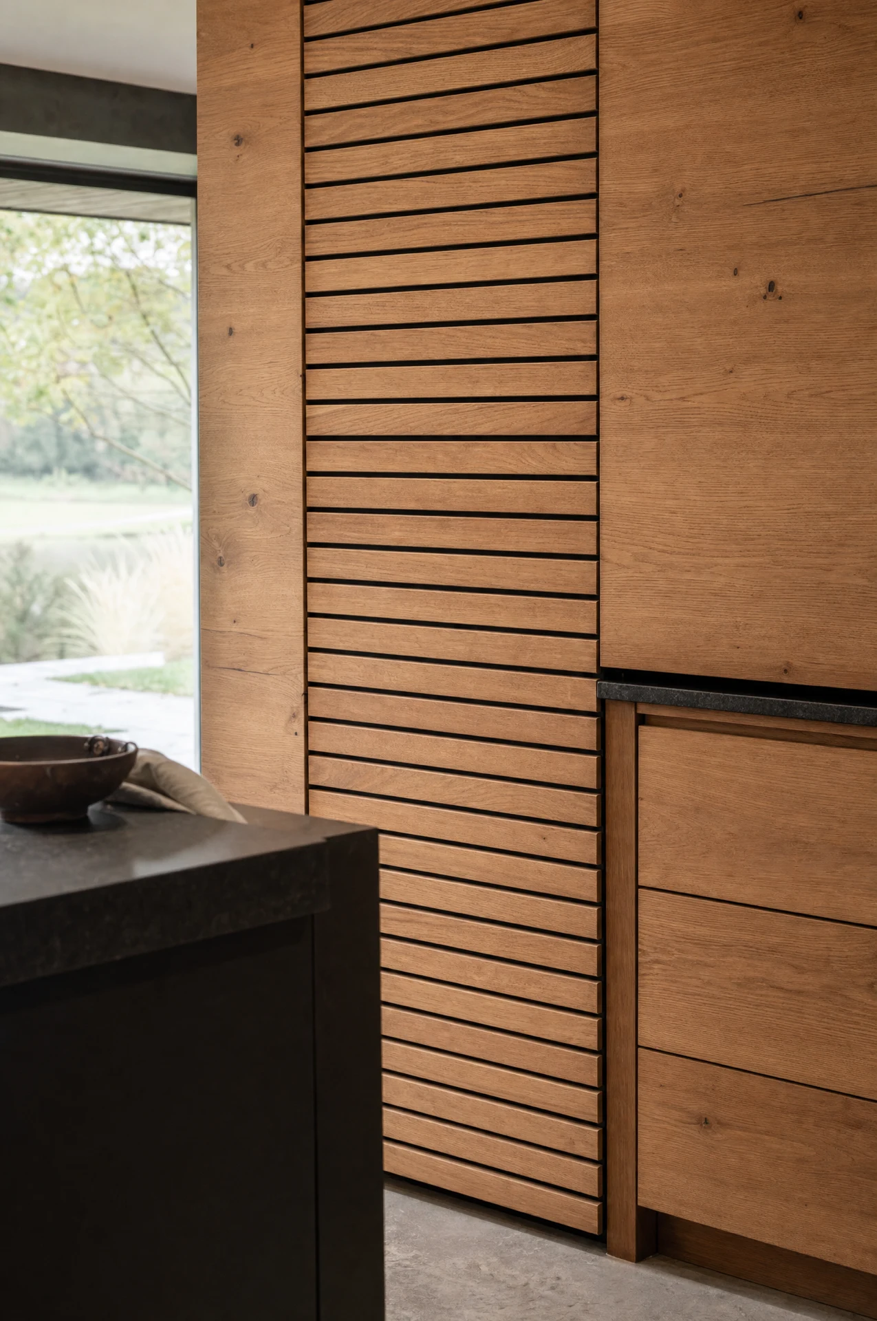A slatted oak panel to the end of an island, The Scandi range by Square & True