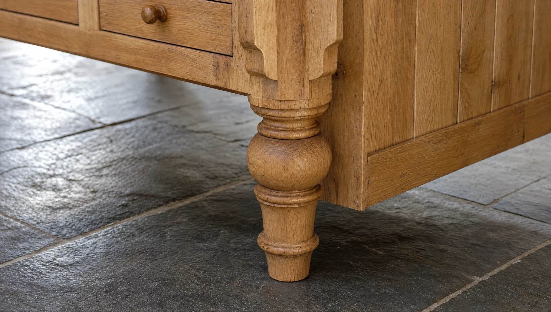A turned oak leg and rail on a freestanding island, Modular & Freestanding by Square & True