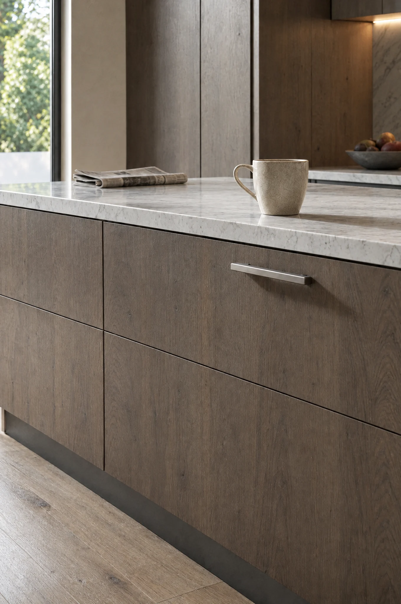 A drawer bank in flush handleless cabinetry, opened.