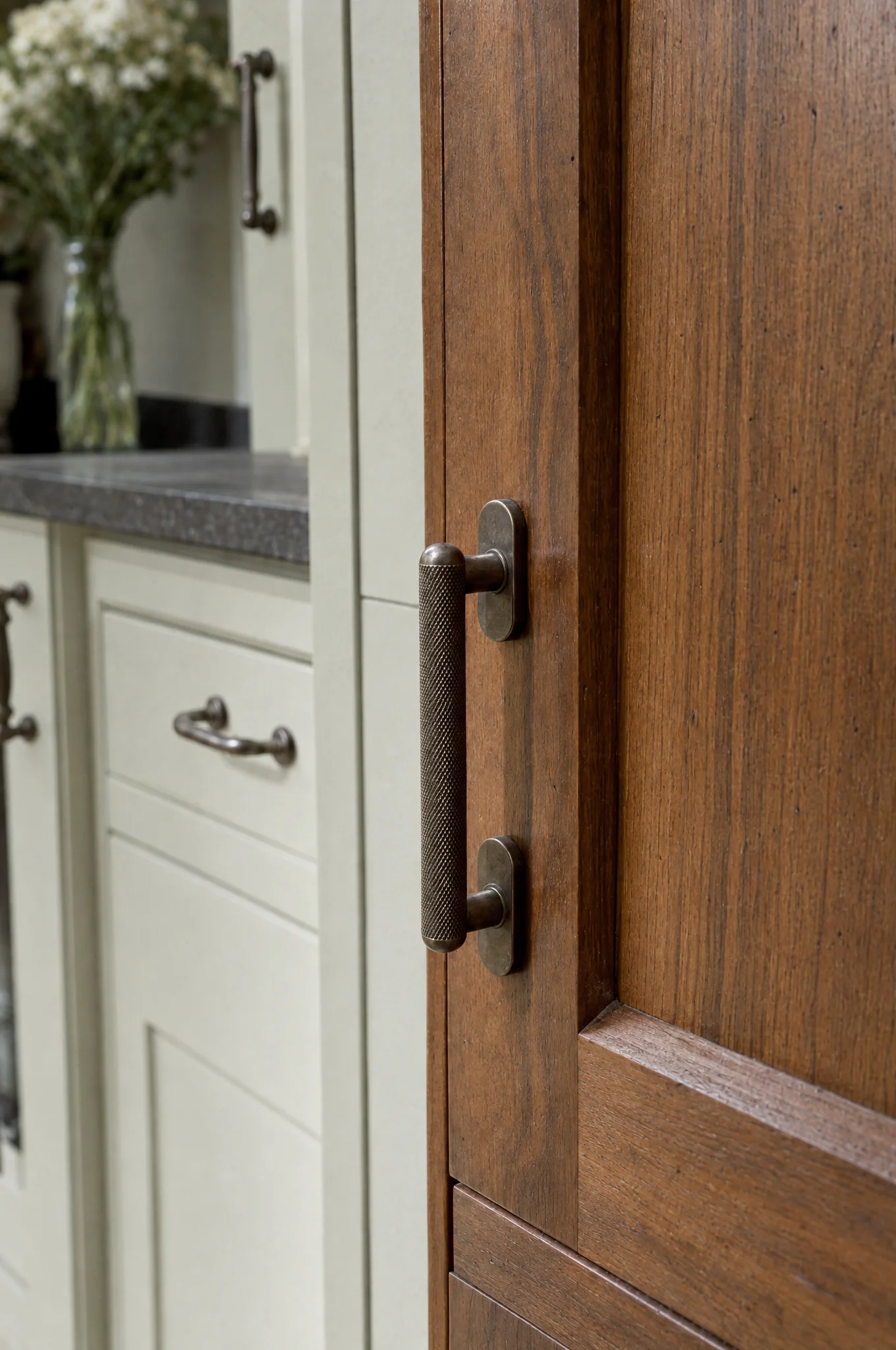 Detail of a hand-painted in-frame door and cup handle from The Suffolk range, Square & True